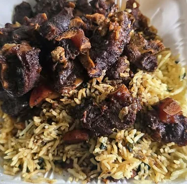 Braised oxtail with carrot over seasoned rice